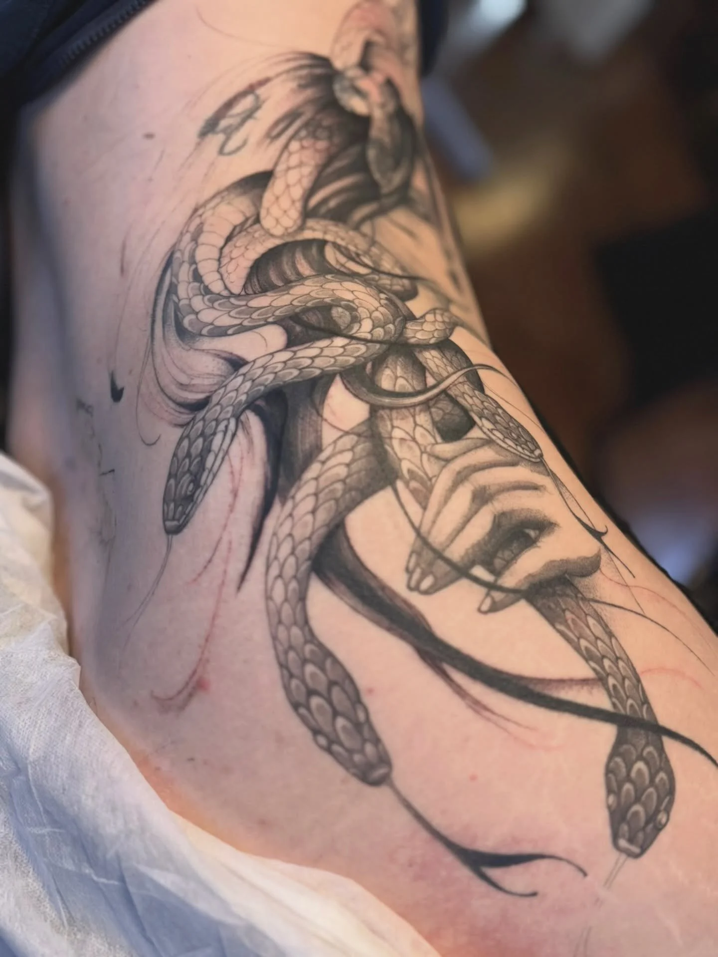 Stunning whimsical snake piece by @mariah.landers ✨
.
.
.
Artist: @mariah.landers 
Studio: @obscura.tattoo 
.
.
.
#ottawaartist #ottawatattoo #obscuratattoo #blackworkartist #snaketattoo