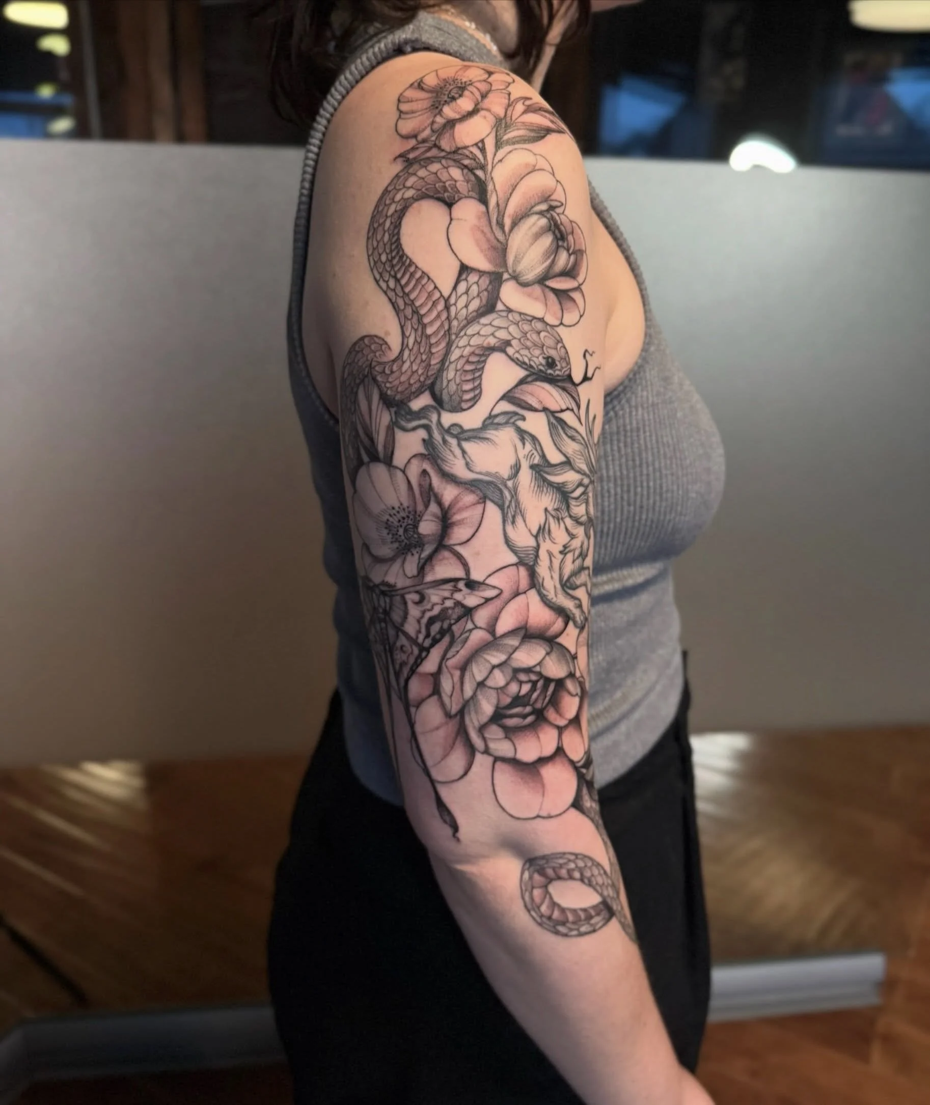 Snakes &amp; Peonies  by @mariah.landers 🐍💐 
.
.
.
Artist: @mariah.landers 
Studio: @obscura.tattoo 
.
.
.
#ottawatattoo #ottawaartist #obscuratattoo #blackwork #snaketattoo