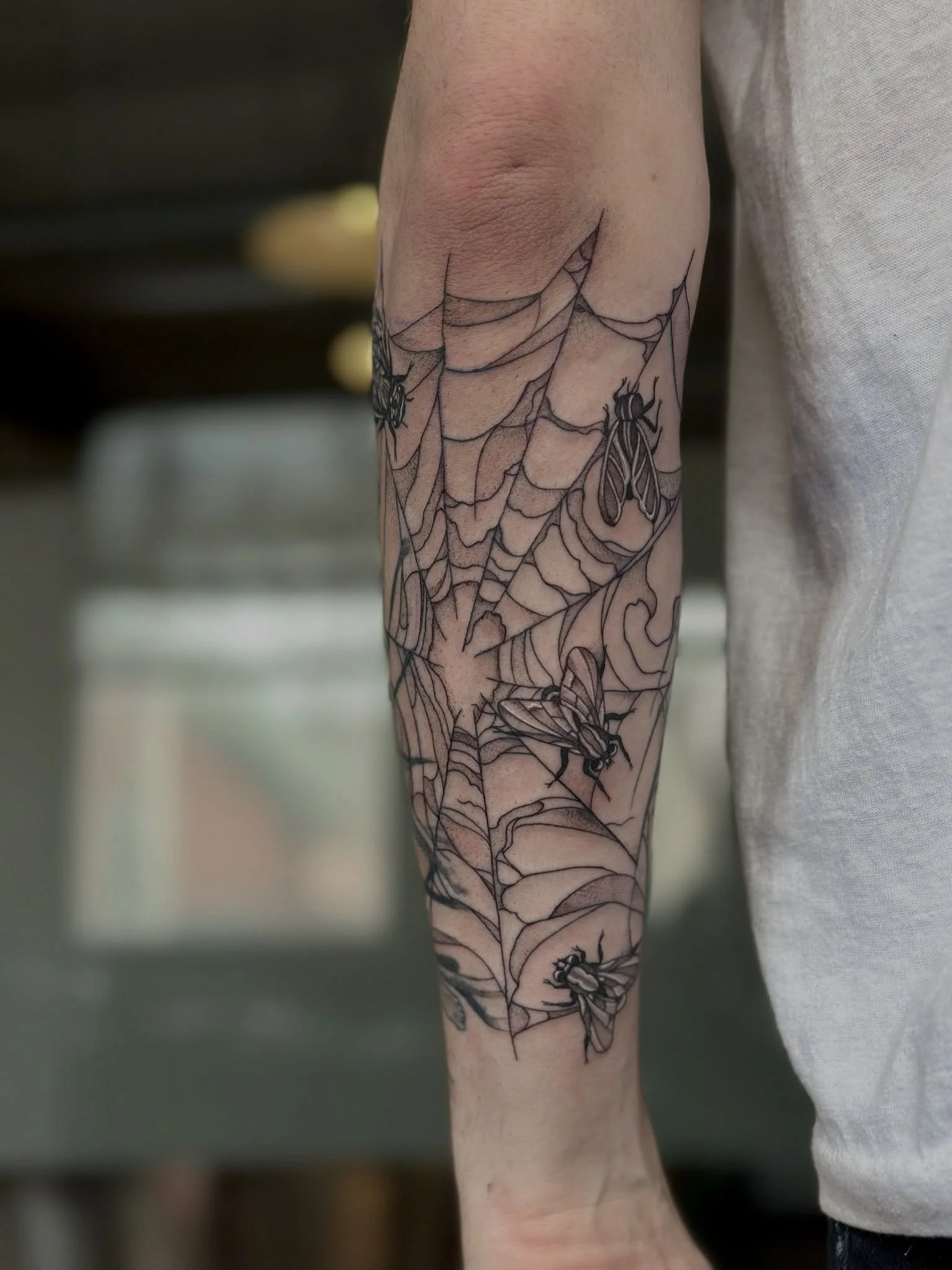 Caught in the Web 🕷️🕸️
.
.
.
Artist: @artbyrobs 
Studio: @obscura.tattoo 
.
.
.
#obscuratattoo #ottawaartist #ottawatattoo #fineline #blackwork