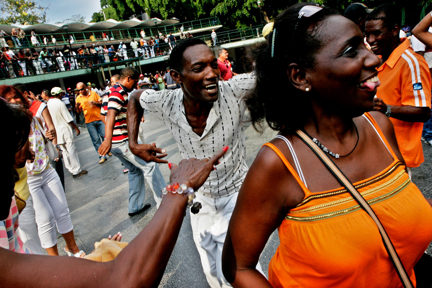  Cubans flirt as they dance to rumba and son in the open air dance floor La Tropical. 