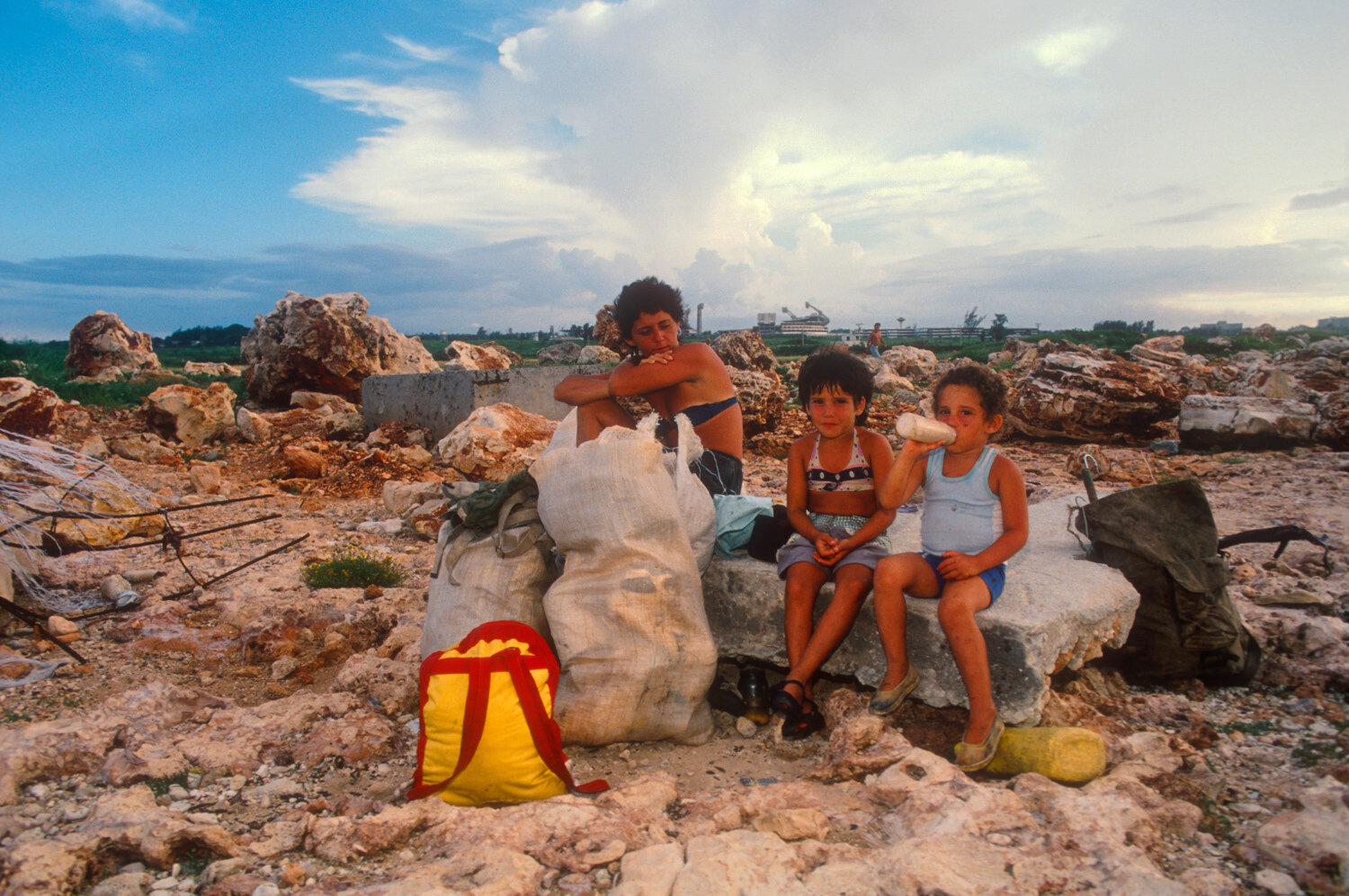  A Cuban family waits for the conditions to be right to leave on a raft. 
