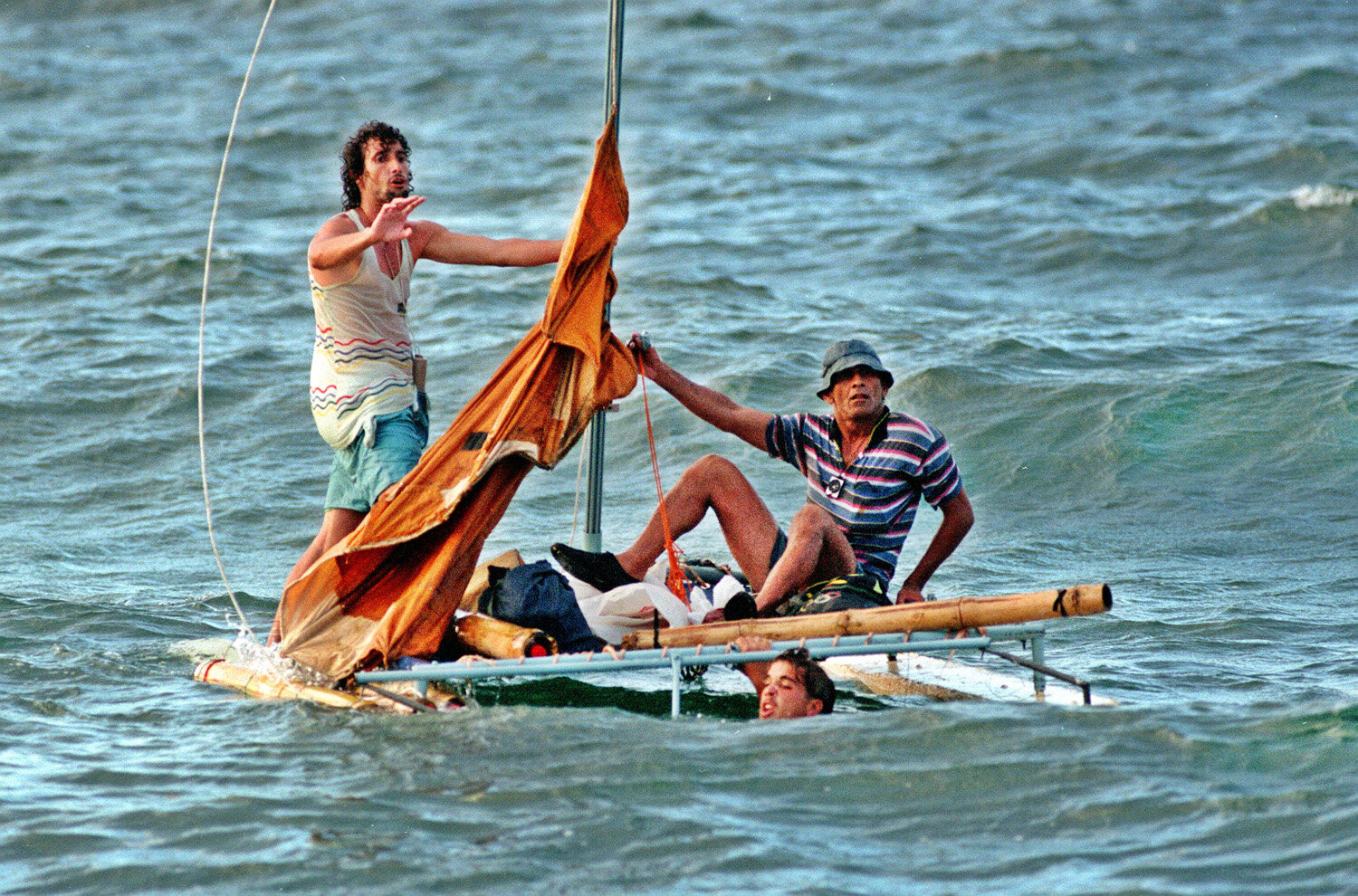  Three Cubans on a very fragile raft... 