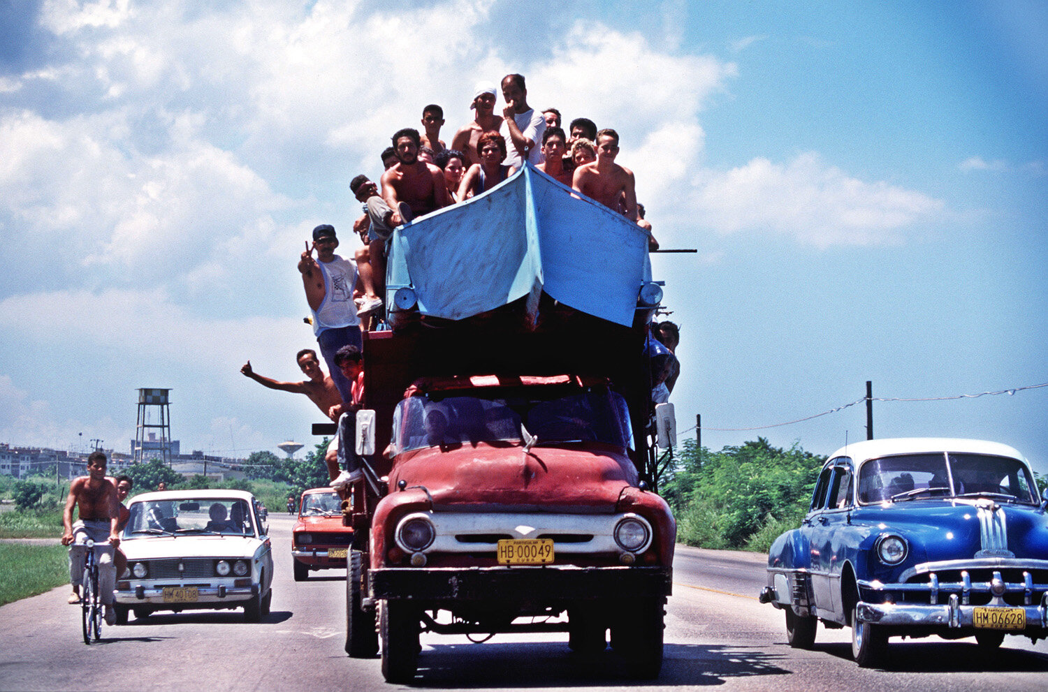  Cubans atop a sophisticated raft mounted on a truck, heading for Cojimar. 