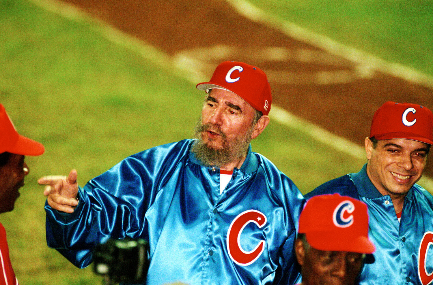  Fidel Castro in baseball wear as acting team manager, stands next to Felipe Perez Roque, Cuba's Foreign Minister, during a friendly baseball match between Cuba and Venezuela, on November 18, 1999, in Havana, Cuba. The match was supposed to feature o