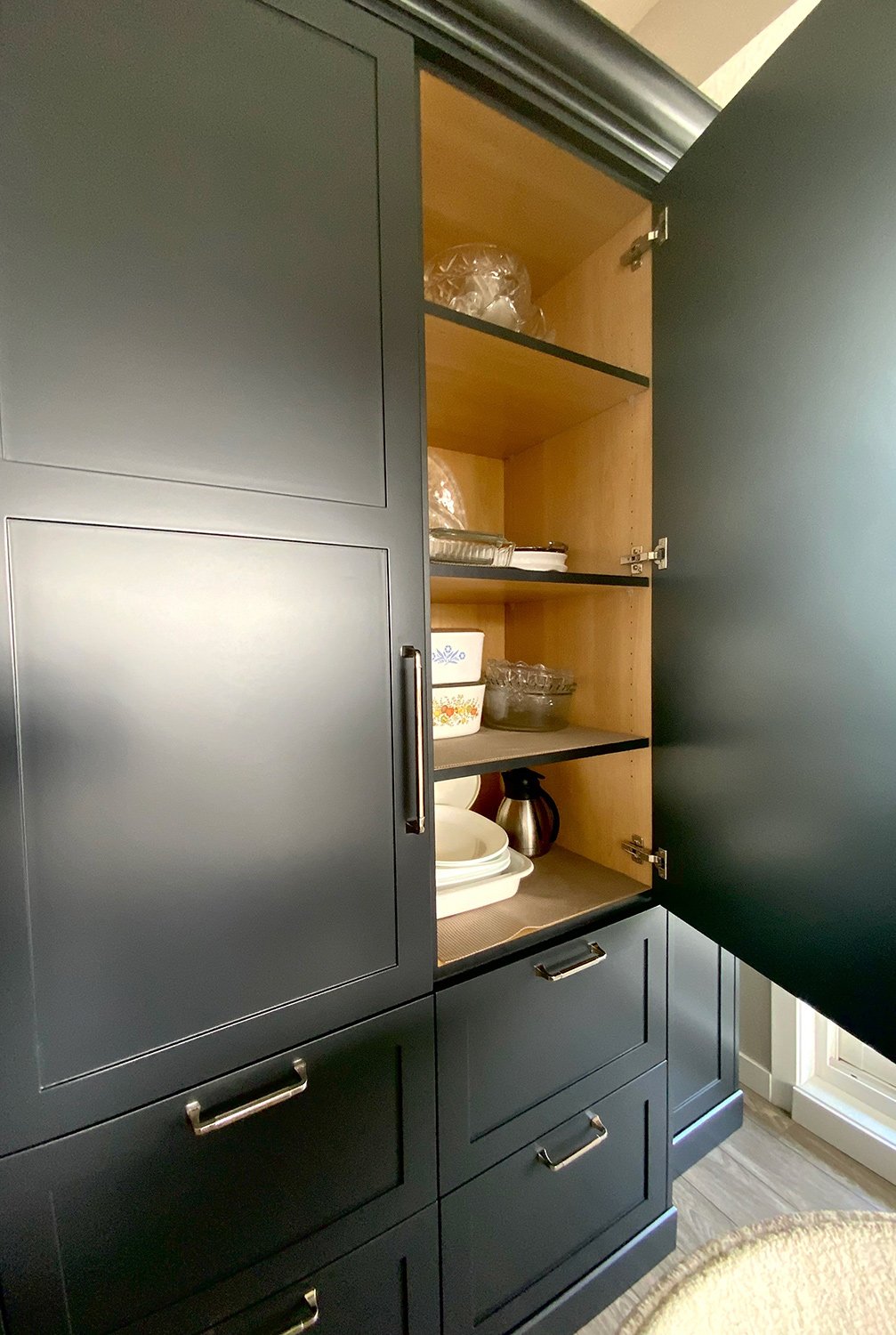 A custom built-in pantry storage is a smart solution for small spaces, maximizing storage, reducing clutter, and supporting organized, stress-free living