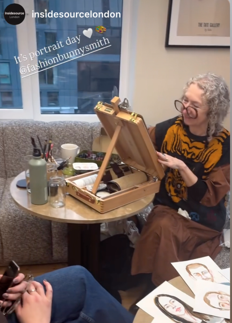 In action at the offices of Inside Source painting staff portraits Feb 2026