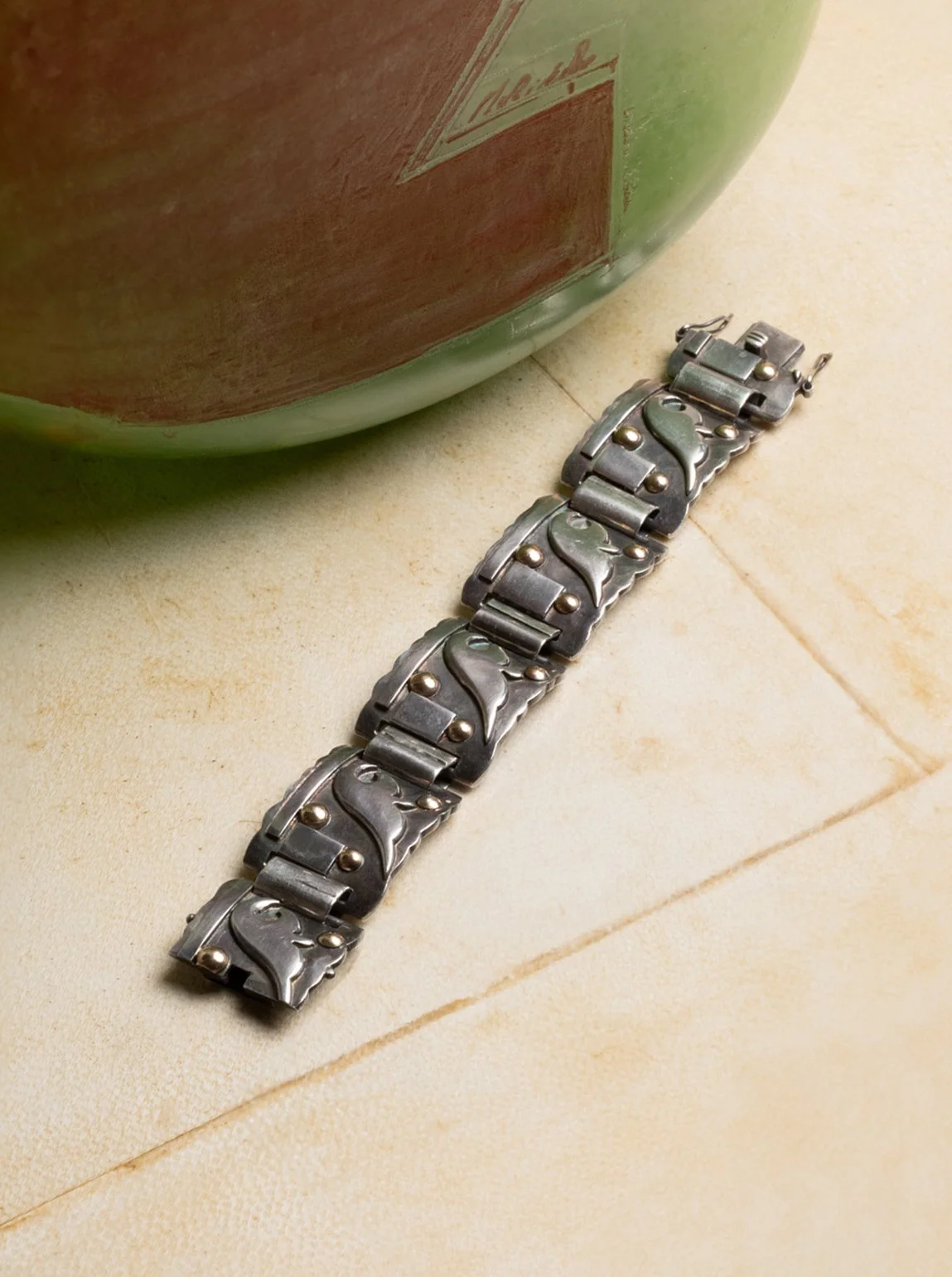 Bracelet articulé en argent et or jaune 18 carats signé Jean Després