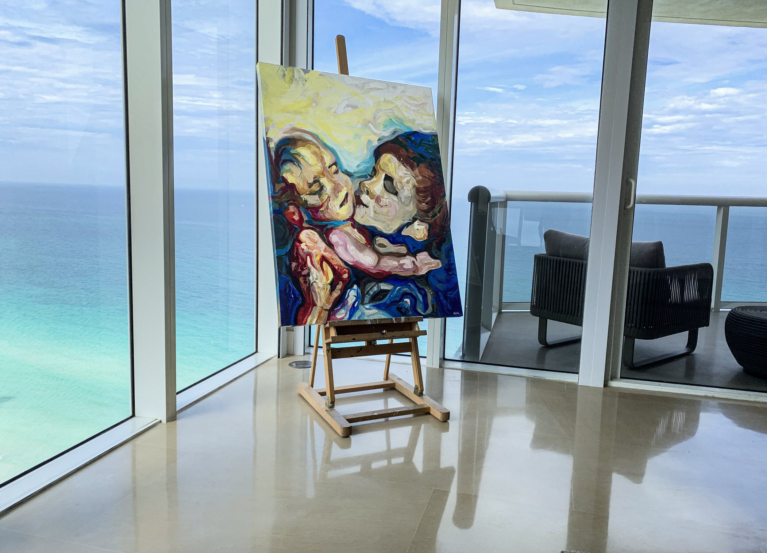 Tiny human's embrace, setting, on easel