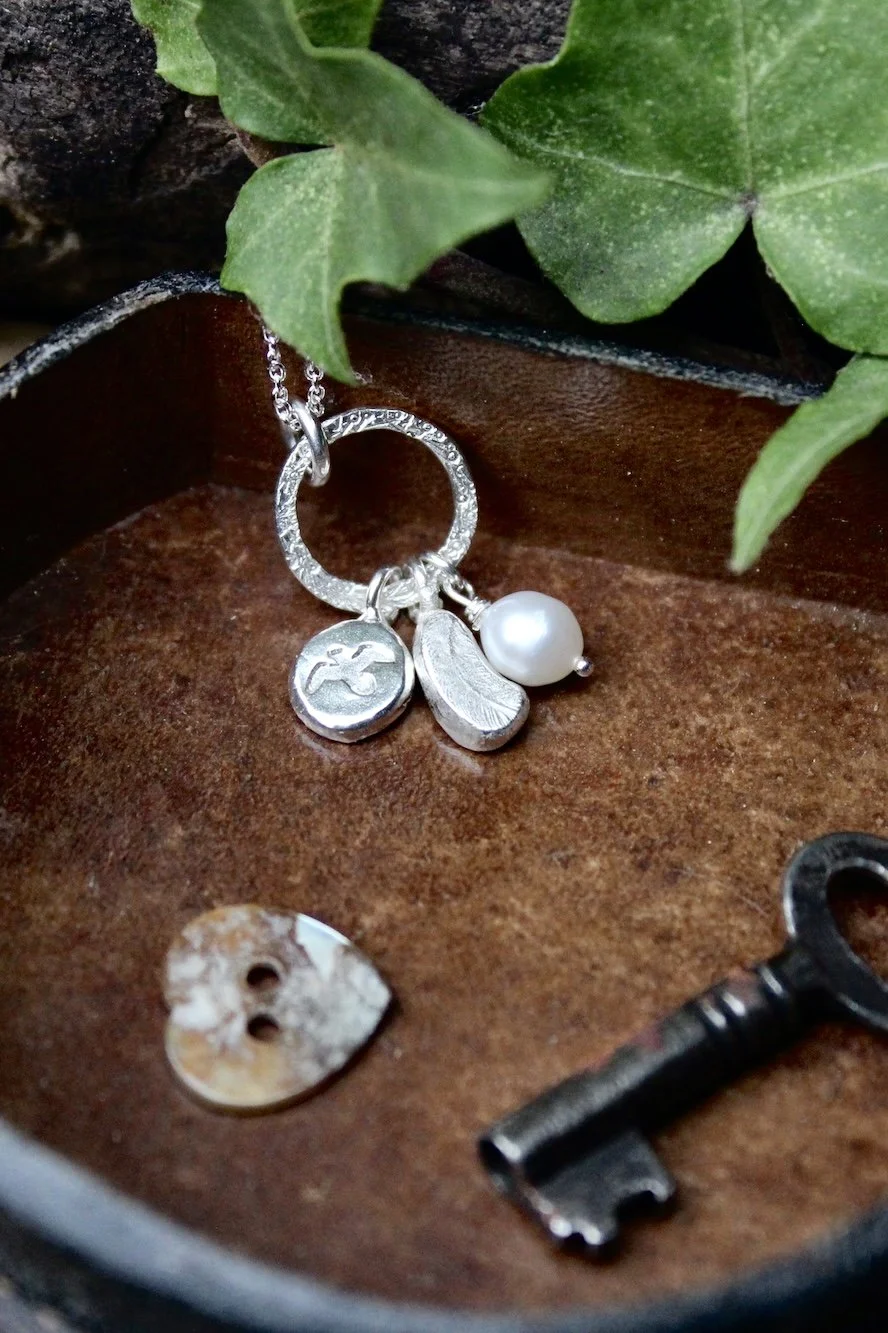 Silver Bird and Feather Necklace: Taking Flight