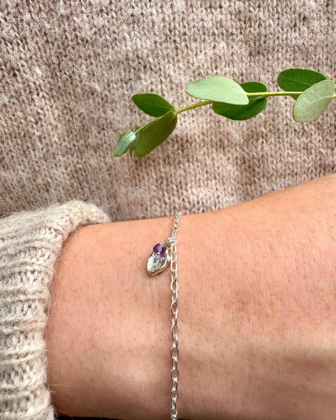 silver-charm-bracelet-with-birthstone-and-leaf.jpg