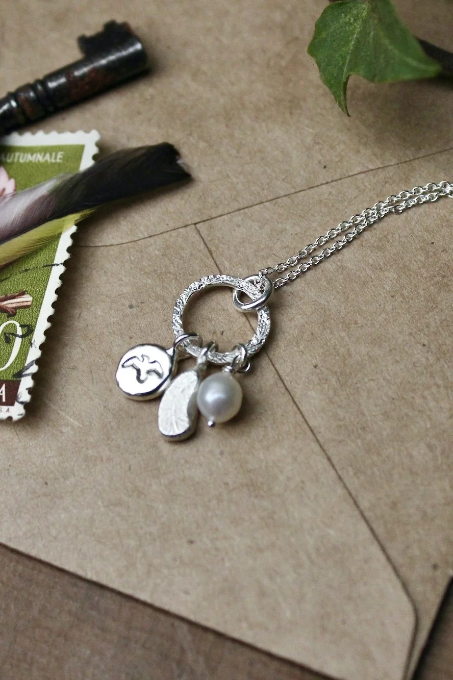 meaningful-necklace-silver-bird-and-feather.JPG