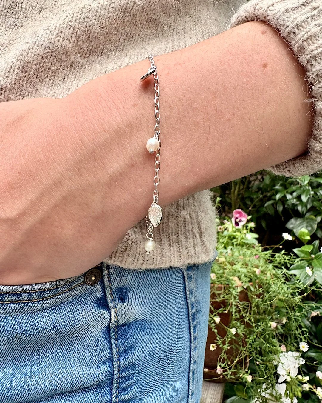 handmade-silver-charm-bracelet-with-botanical-charms.JPG