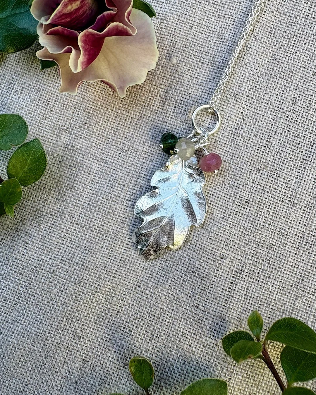 silver-necklace-with-tourmaline-oak-leaf.jpg
