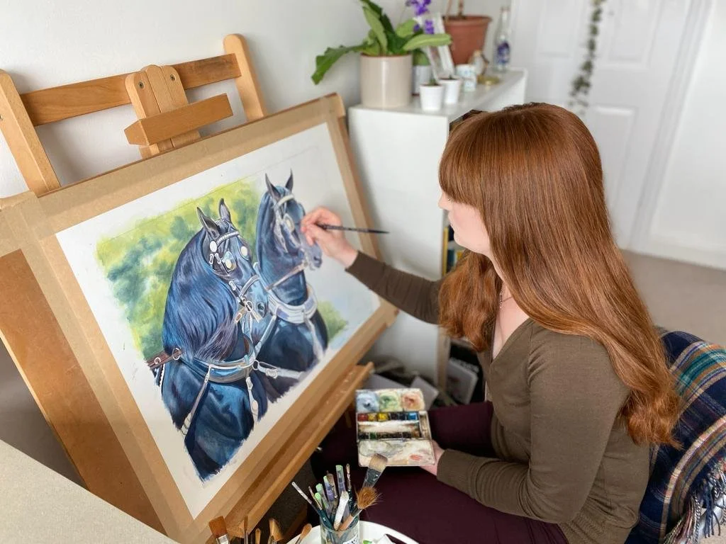Joanne Kitson working on a horse portrait commission in watercolour, demonstrating the detailed process of creating a bespoke animal portrait.