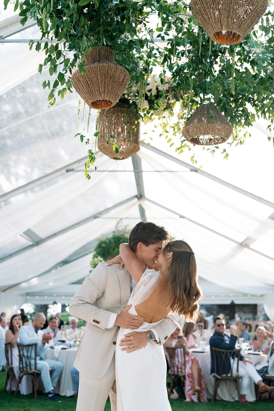 hanging flower installation in clear tent with apres and phos - amanda nippoldt photography