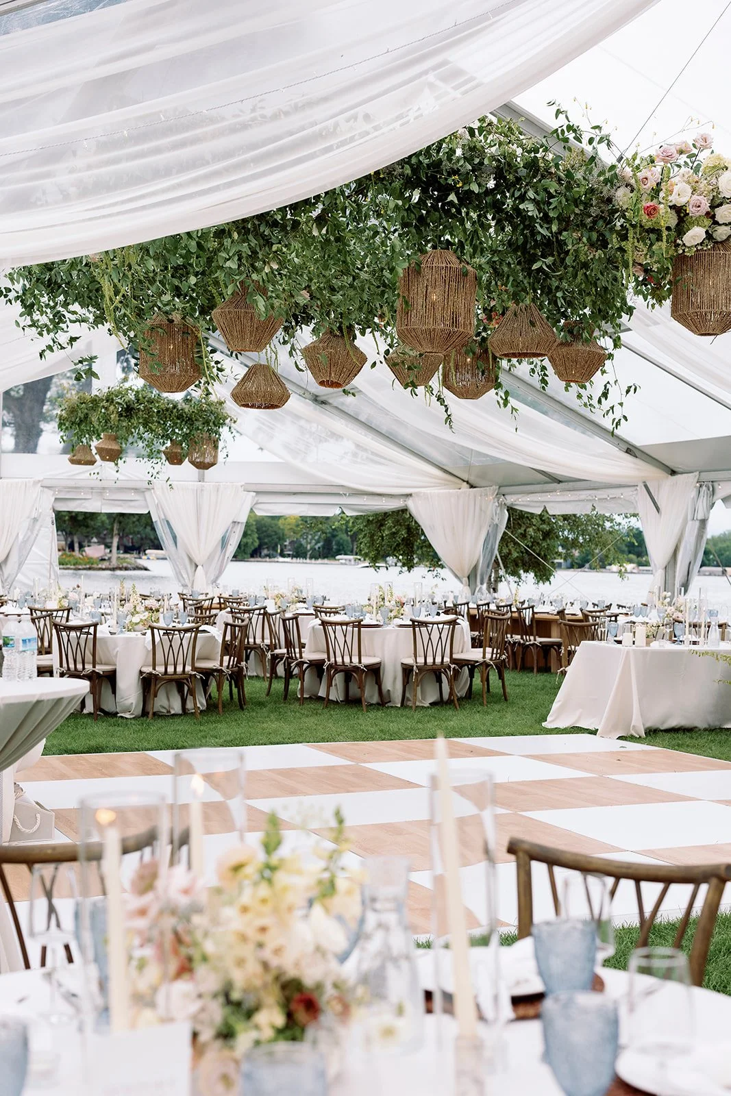hanging flower installation in clear tent with apres and phos - amanda nippoldt photography