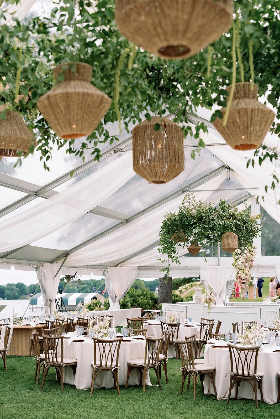 hanging flower installation in clear tent with apres and phos - amanda nippoldt photography
