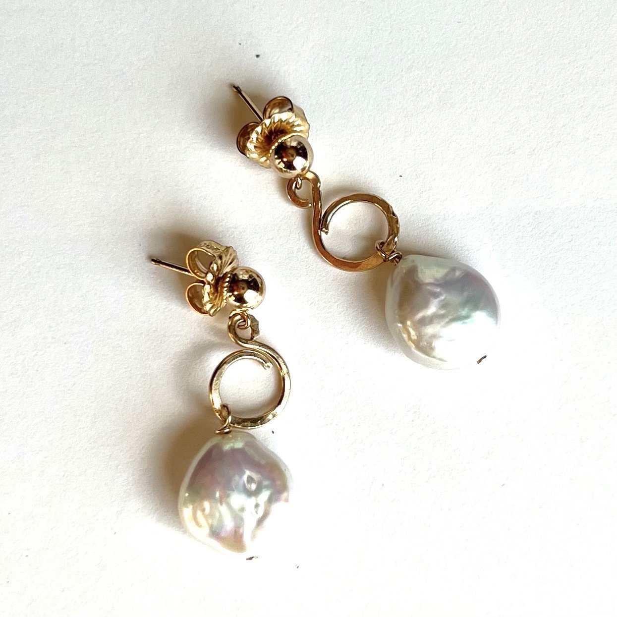 Hammered smal loop with lg pearls Earrings.jpeg