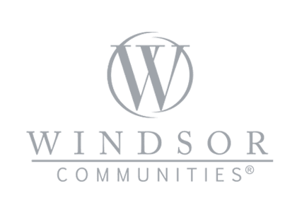 Windsor Communities logo with a large 'W' inside a circle above the text 'Windsor Communities' on a black background.