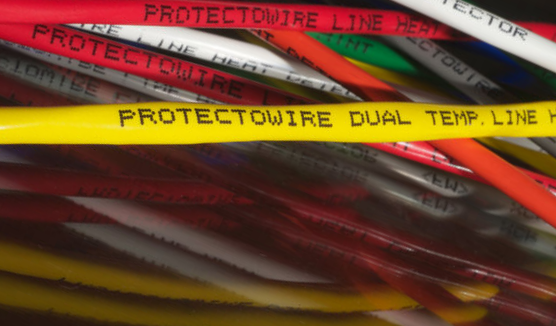Câbles colorés avec le texte "PROTECTOWIRE DUAL TEMP. LINE HEAT" et d'autres inscriptions.