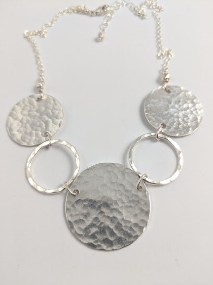 Lakshmi Hammered Silver Disc Pendant Necklace By Charlotte's Web Jewellery  | notonthehighstreet.com