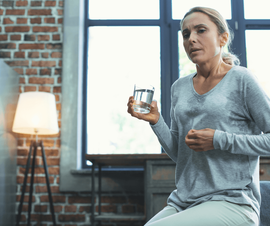 InHouse Pilates blog The benefits of being active image woman having a hot flush.