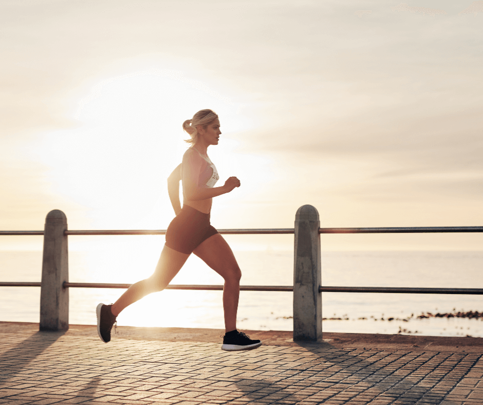 InHouse Pilates blog The benefits of being active image woman running outdoors.