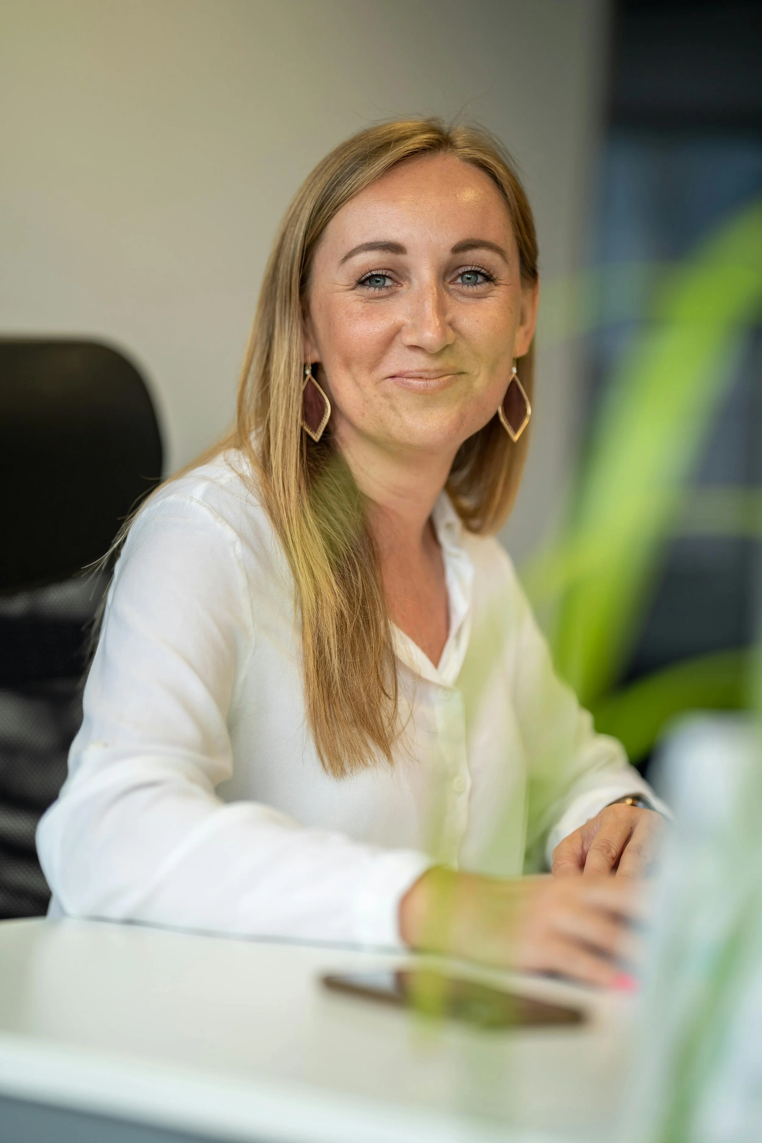 Senior leader within organisation sitting at desk