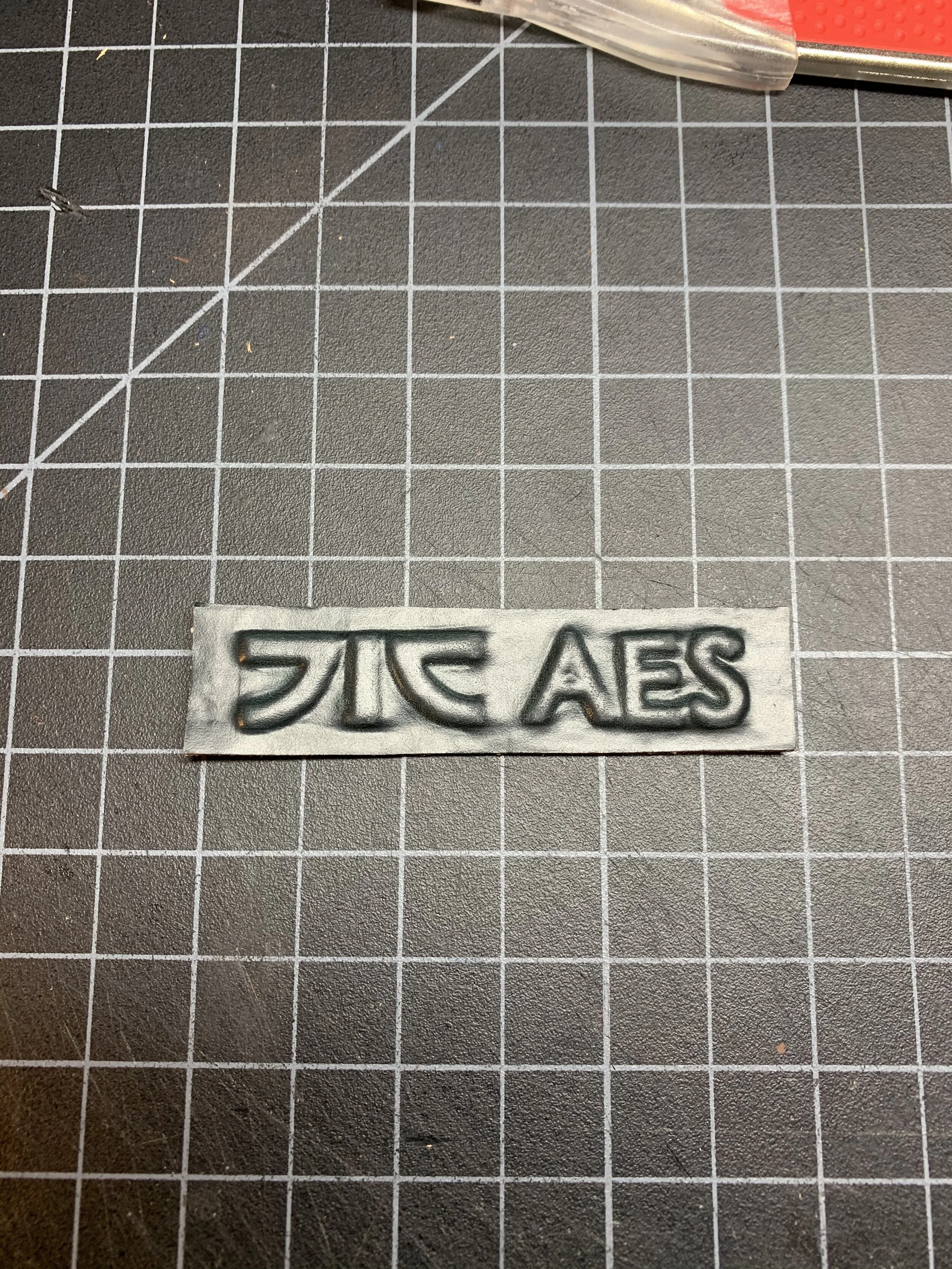 Logo and Initial tag for back of belt.