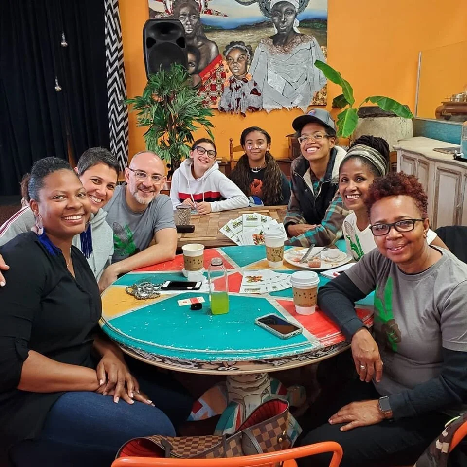 SoLA Food Co-op member-owners and local South LA community members gathering around a dining table in Crenshaw.