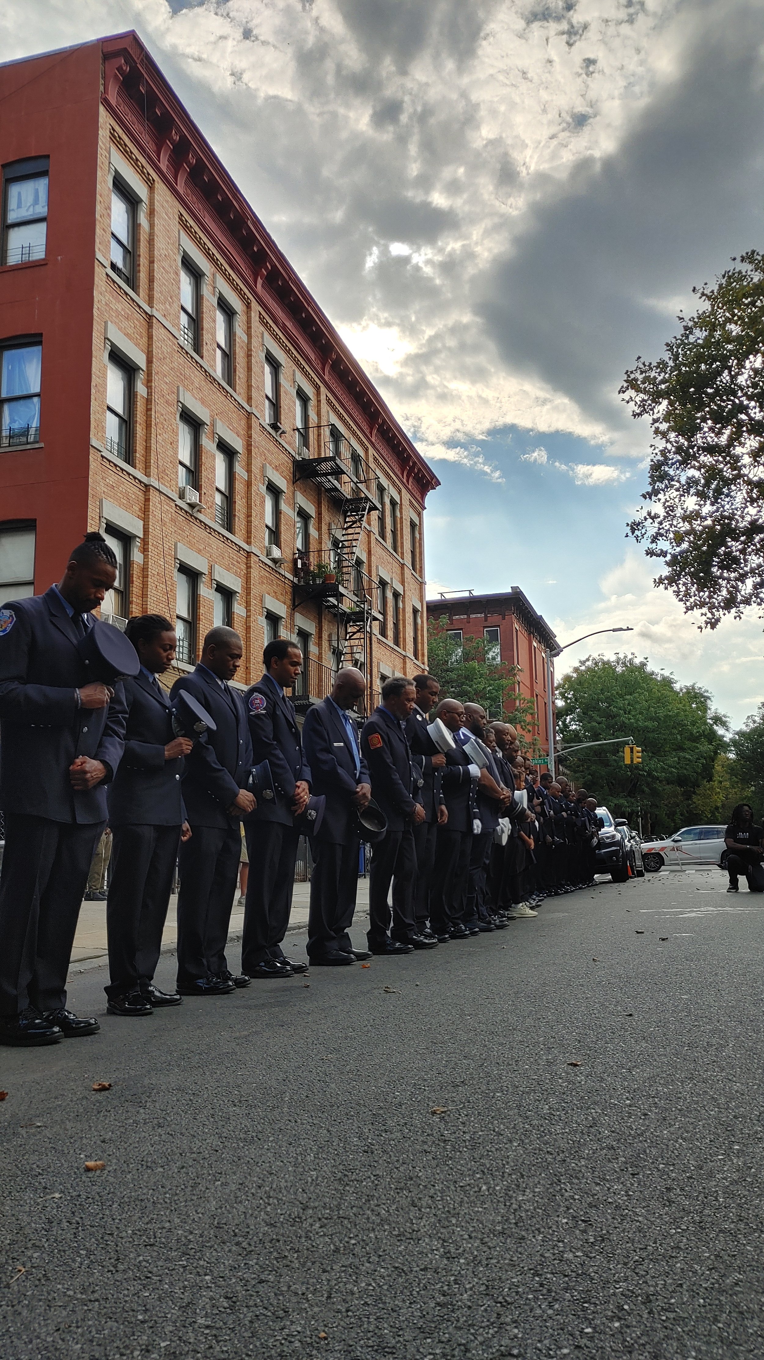  FDNY Vulcan Society Members at 9/11 Memorial at Quincy Street Community Garden for the 22nd Anniversary as the Rev. C. Vernon Simpson, Jr gives a word of prayer.  photo cred: Donna Marie D.  