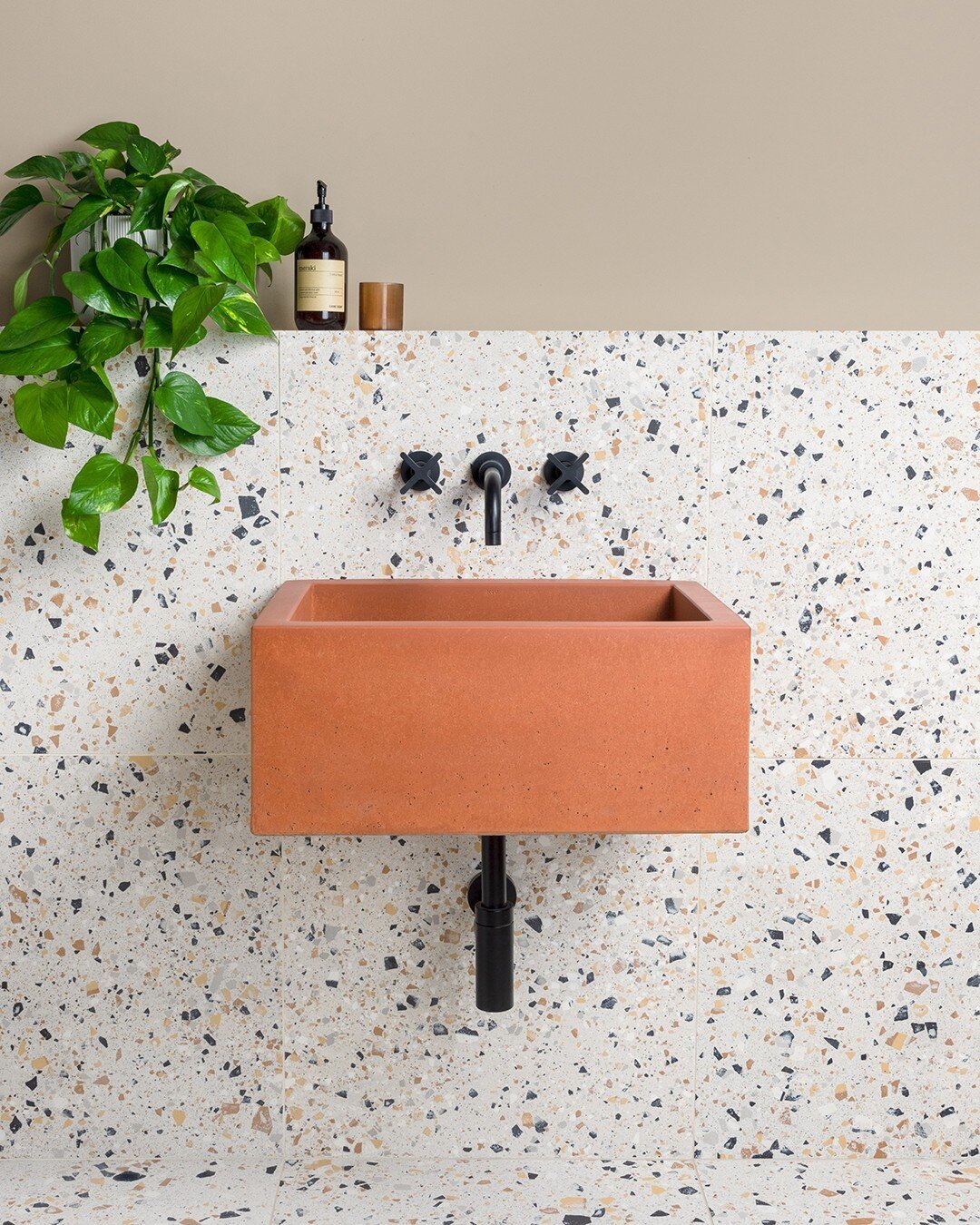 Balance the coolness of terrazzo and add a layer of warmth to the space with an Ember basin 💫⁠
⁠
The simple, rectangular form of this medium-sized Terra concrete washbasin is the perfect fit for a variety of bathroom settings.⁠
⁠⁠
Available in a cho