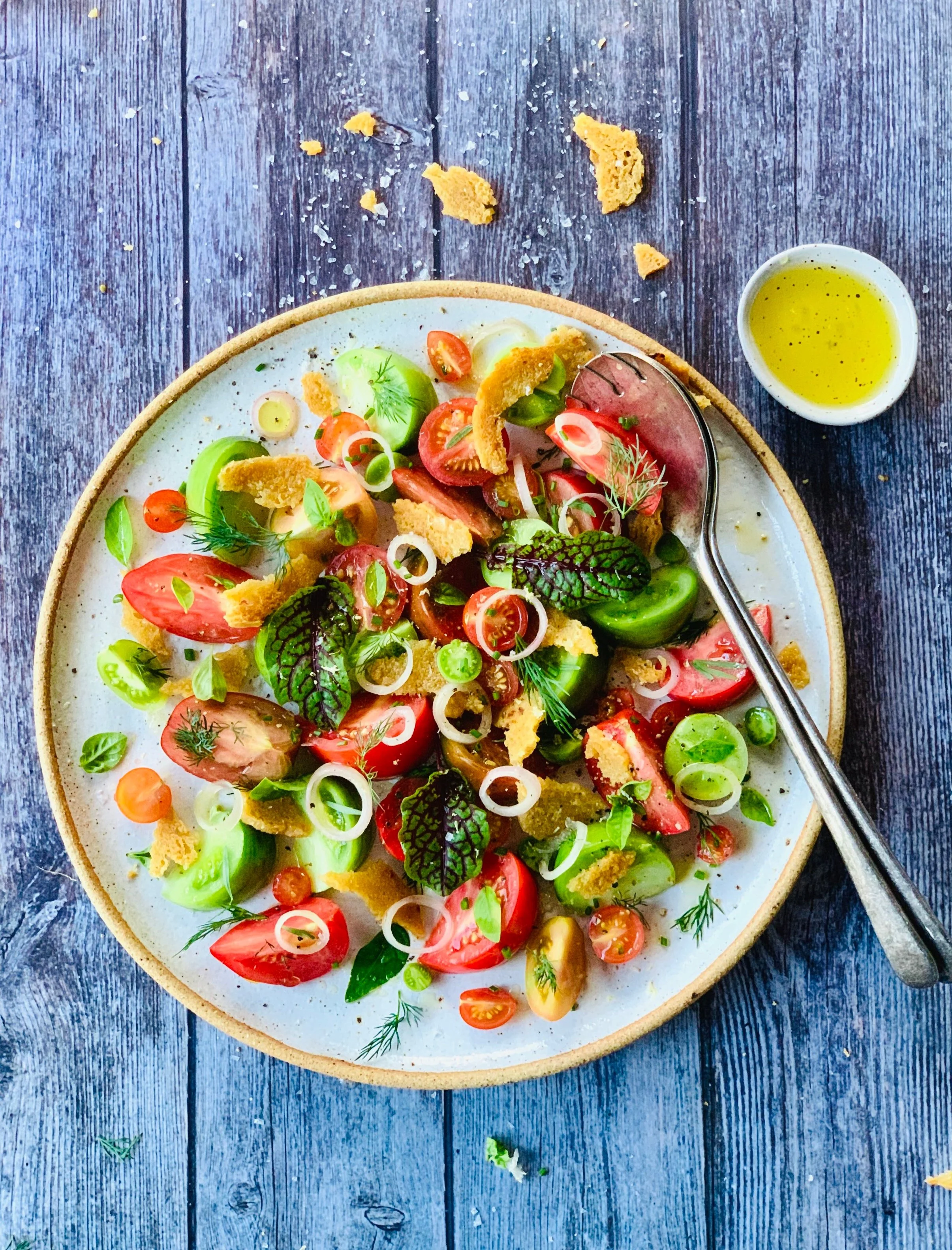 Tomato salad with blackberry vinegar, pickled shallot, tarragon oil and bread