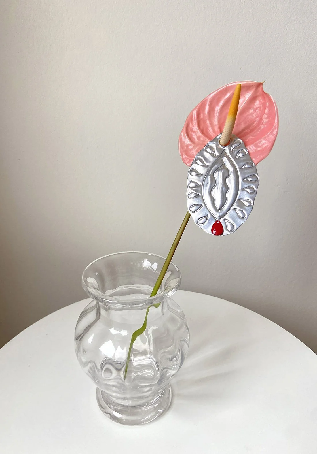 Softy, 2025. Embossed aluminium, pvc, anthurium flower, vase. 5cm x 7cm approx.