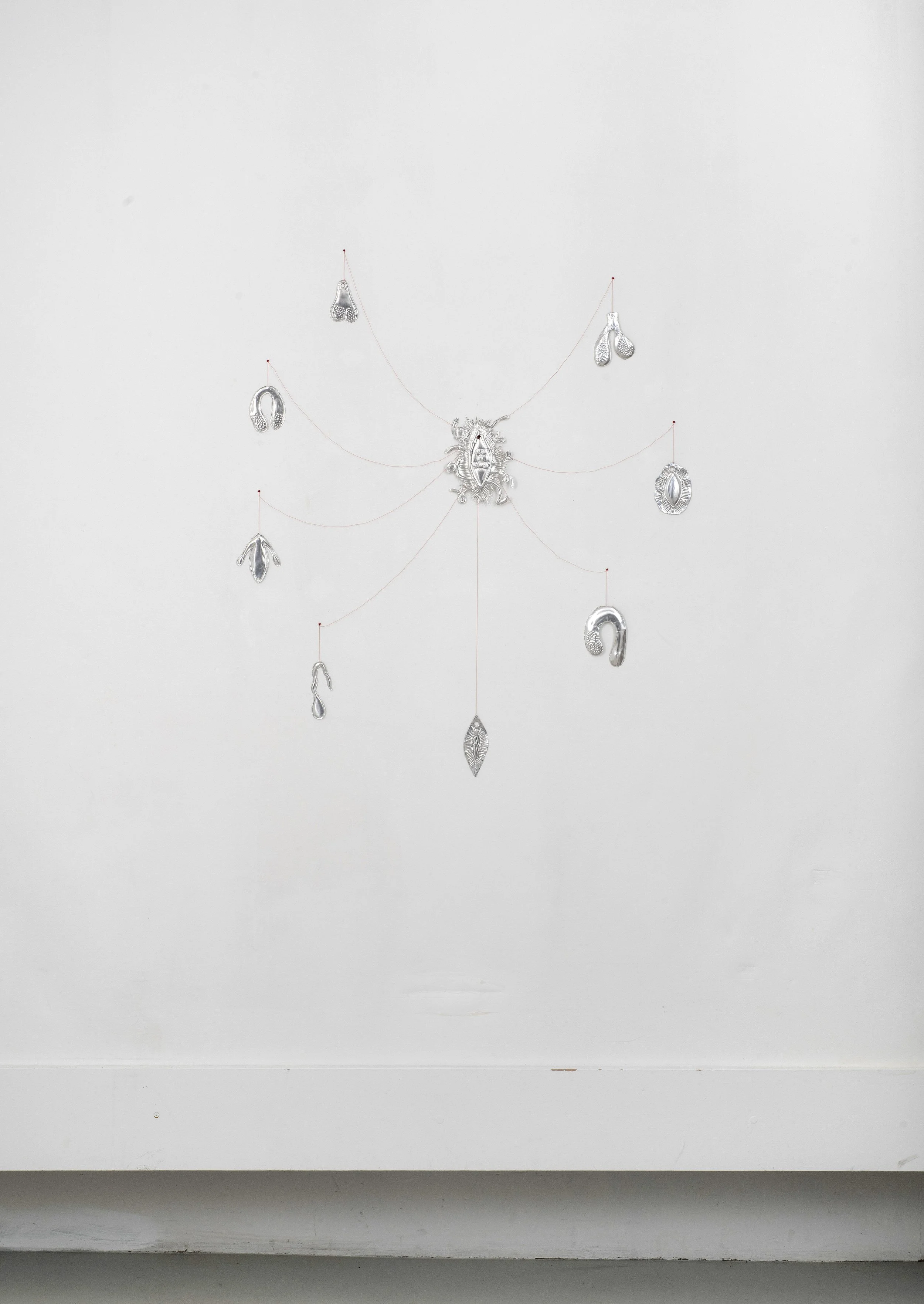Not a Wound 2, 2025 (detail). Embossed aluminium, cotton thread, glass beads, nails.