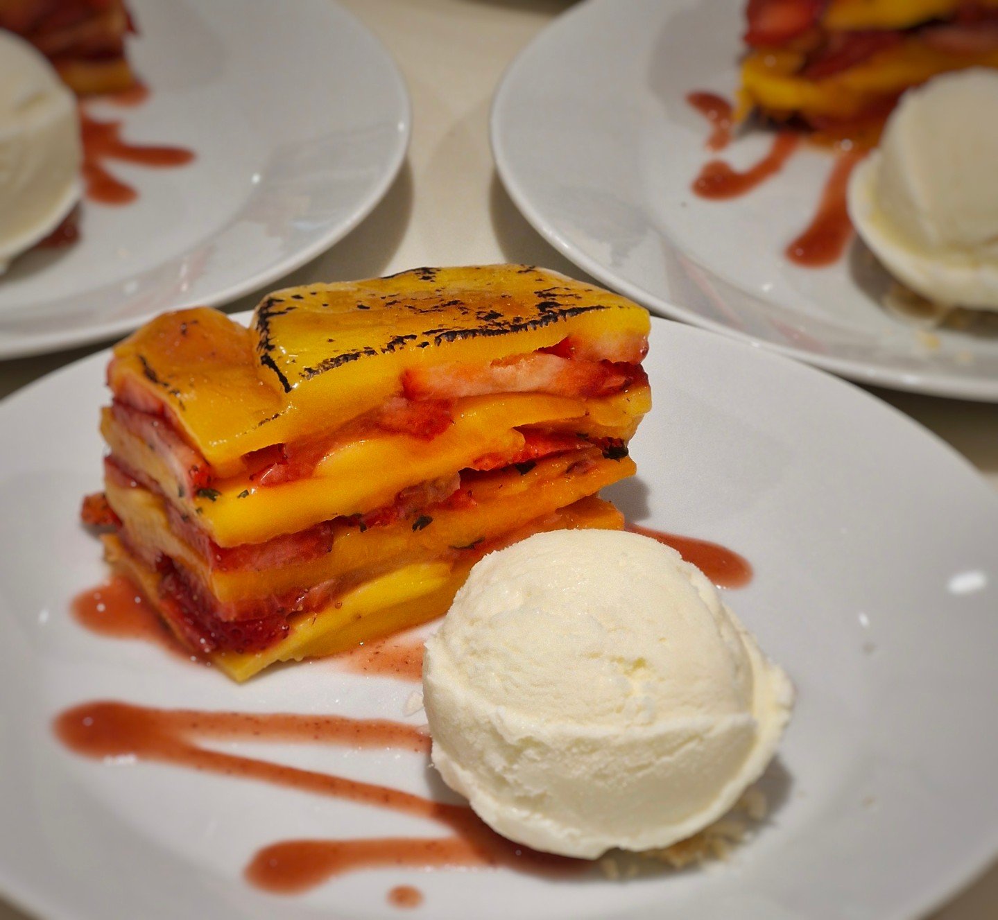 Spring is in the air&hellip; and so is dessert magic! 🍓🥭

Mango &amp; Strawberry &lsquo;Lasagne&rsquo;: layers upon layers of compressed mango and strawberry, caramelized to perfection, and served with creamy coconut ice cream. Simple, fresh, and a