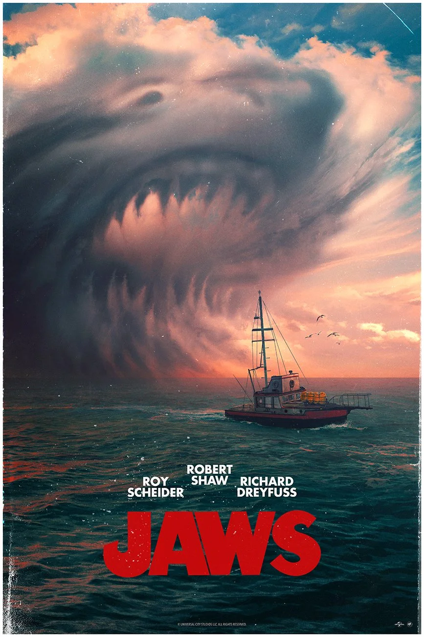 Promotional poster for the movie Jaws showing a boat on the ocean with a stormy sky and a massive shark's face and open mouth in the clouds.