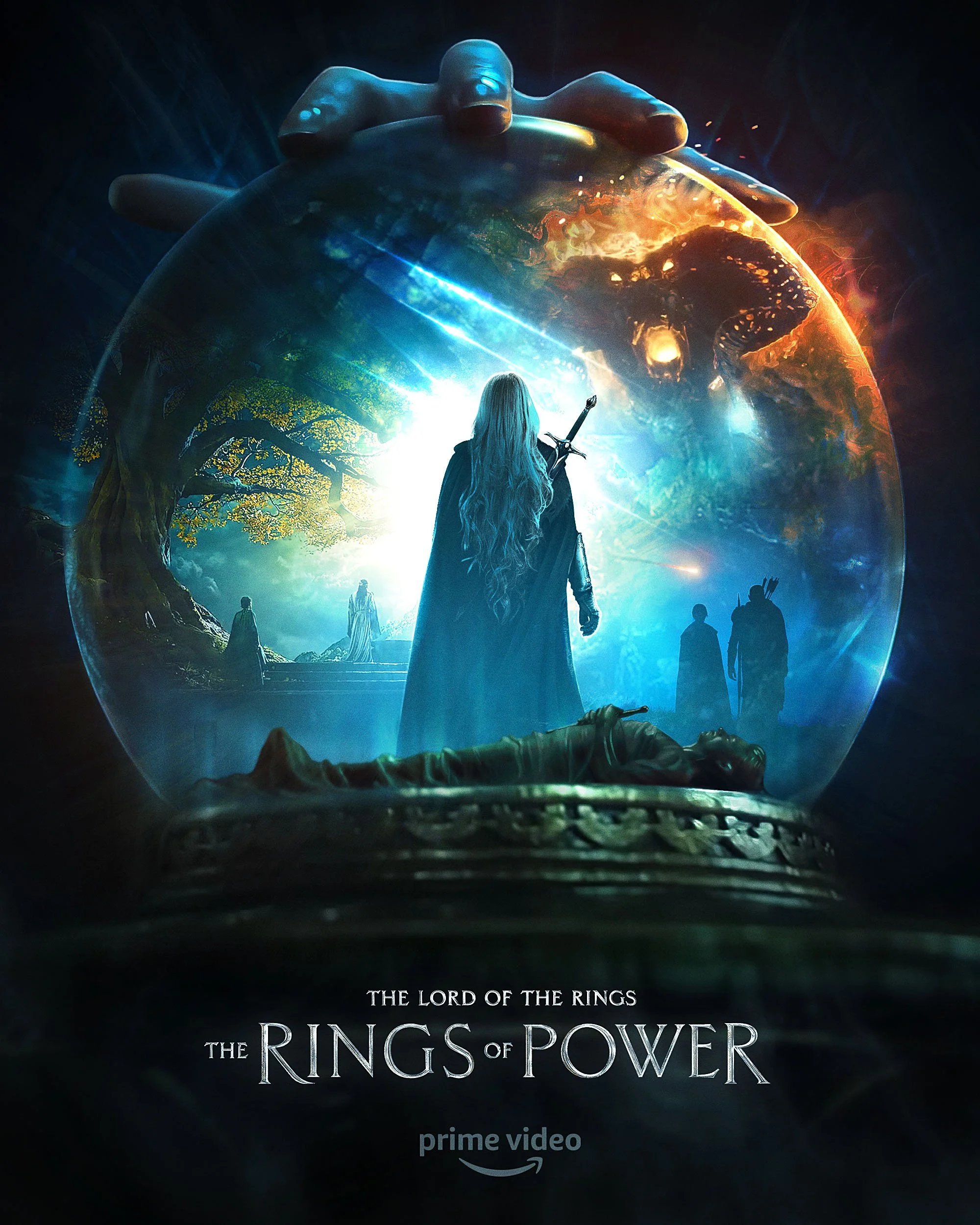 A promotional poster for the movie 'The Lord of the Rings: The Rings of Power' showing a large hand holding a glowing globe with a scene of a woman with long hair holding a sword, standing before a tree, with other characters in the background.