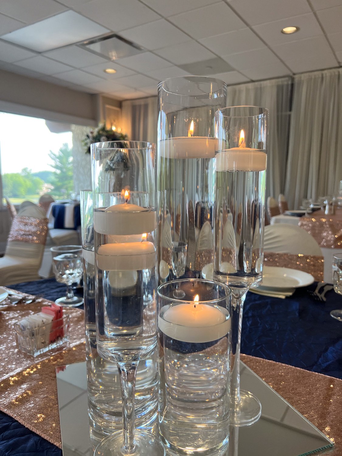 Lighted-candles-centerpiece-by-Simply-Elegant.jpg