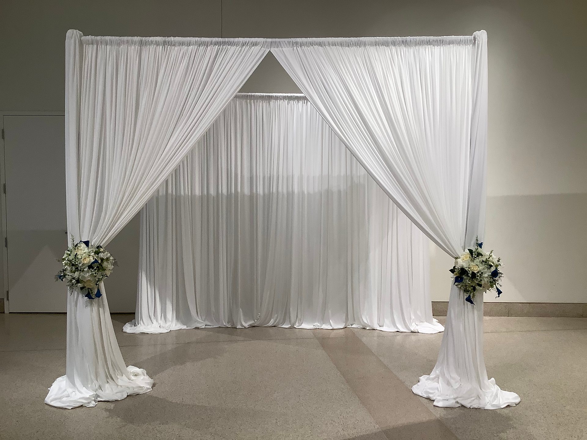 Draping Design All White with Floral Accents