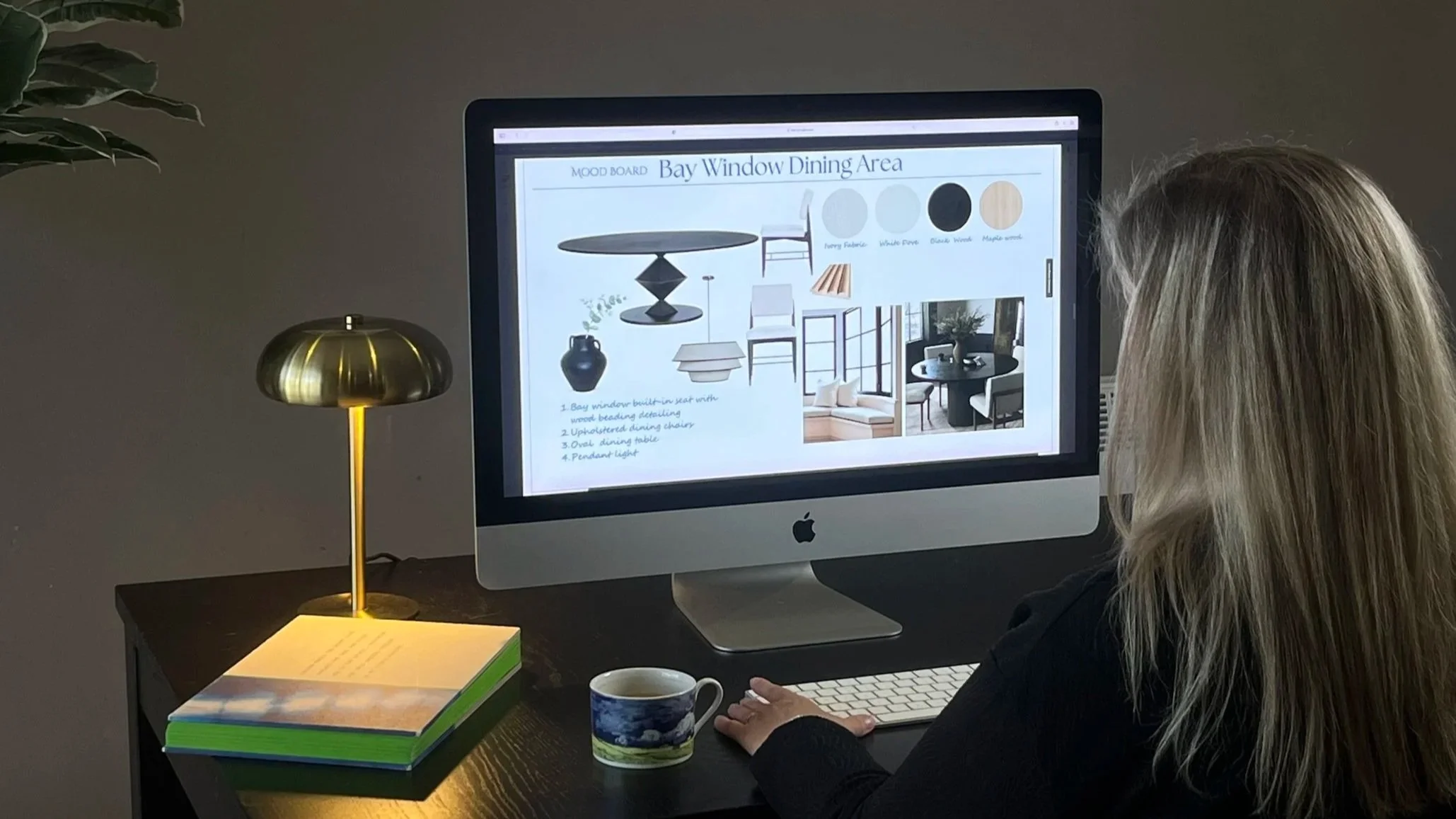 Interior designer creating a mood board and selecting materials for a residential interior design project.