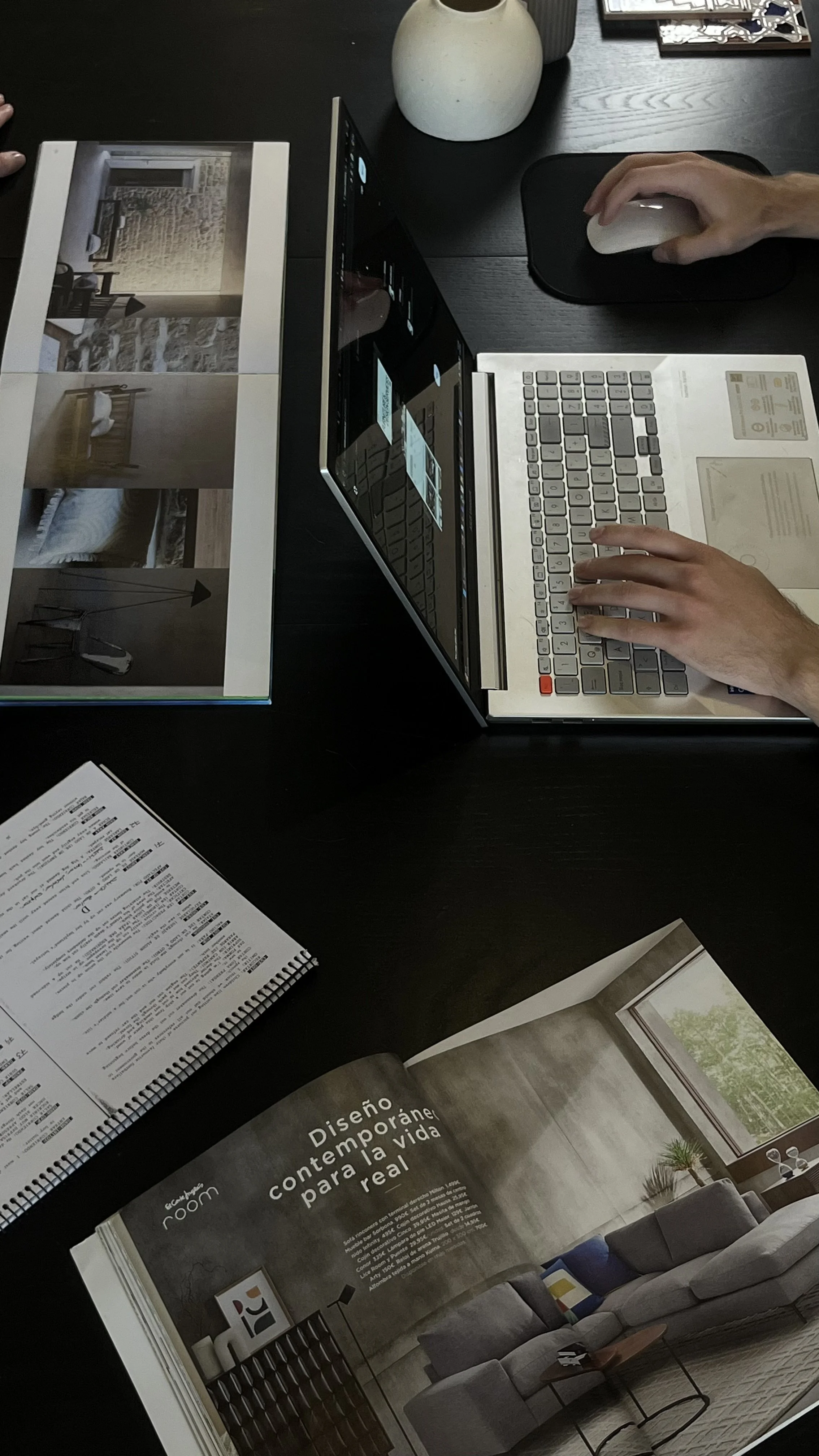 Interior designer reviewing project documentation and design concepts during a residential interior design project.