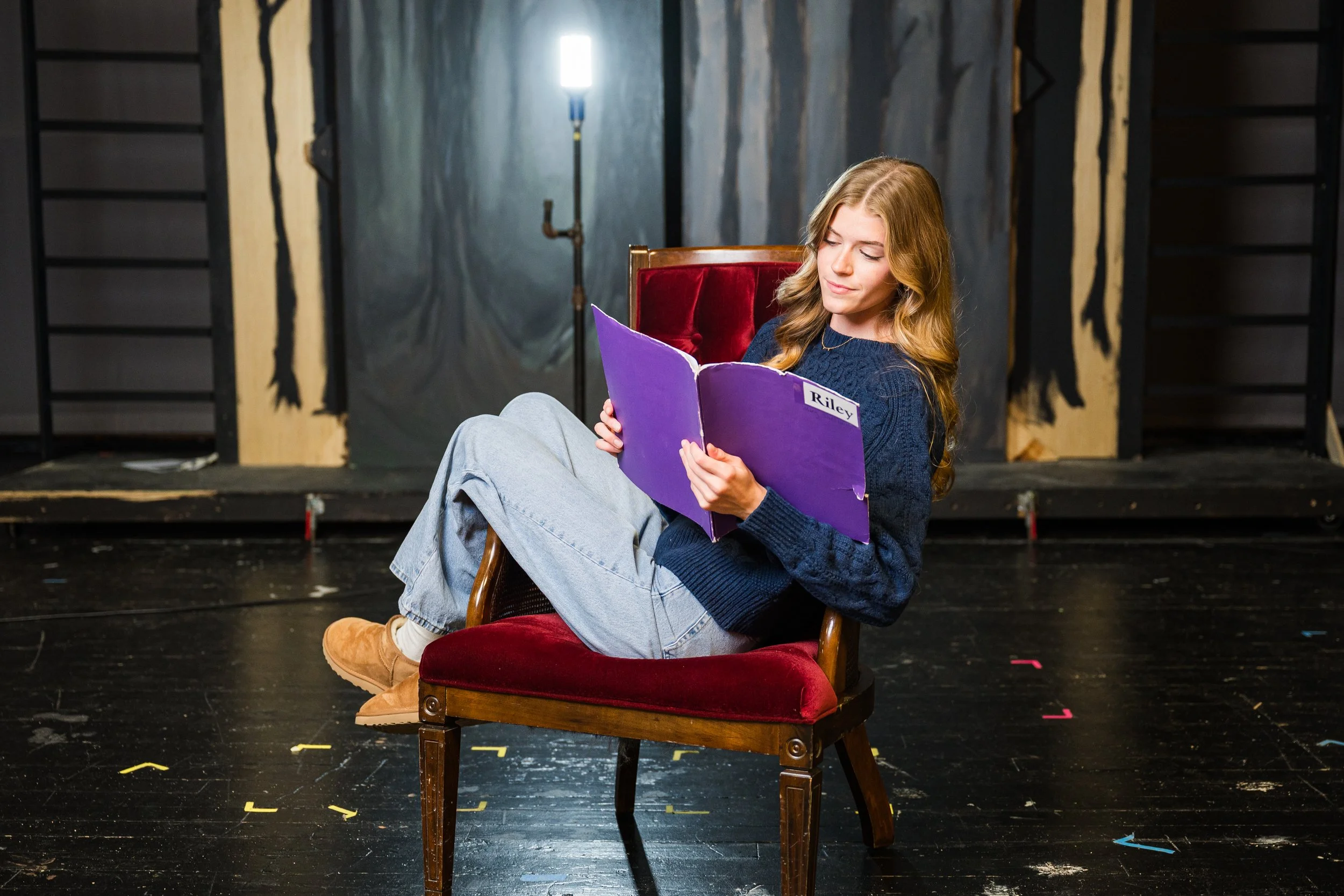 Personal senior portrait with meaningful prop in Bloomington Normal Illinois.