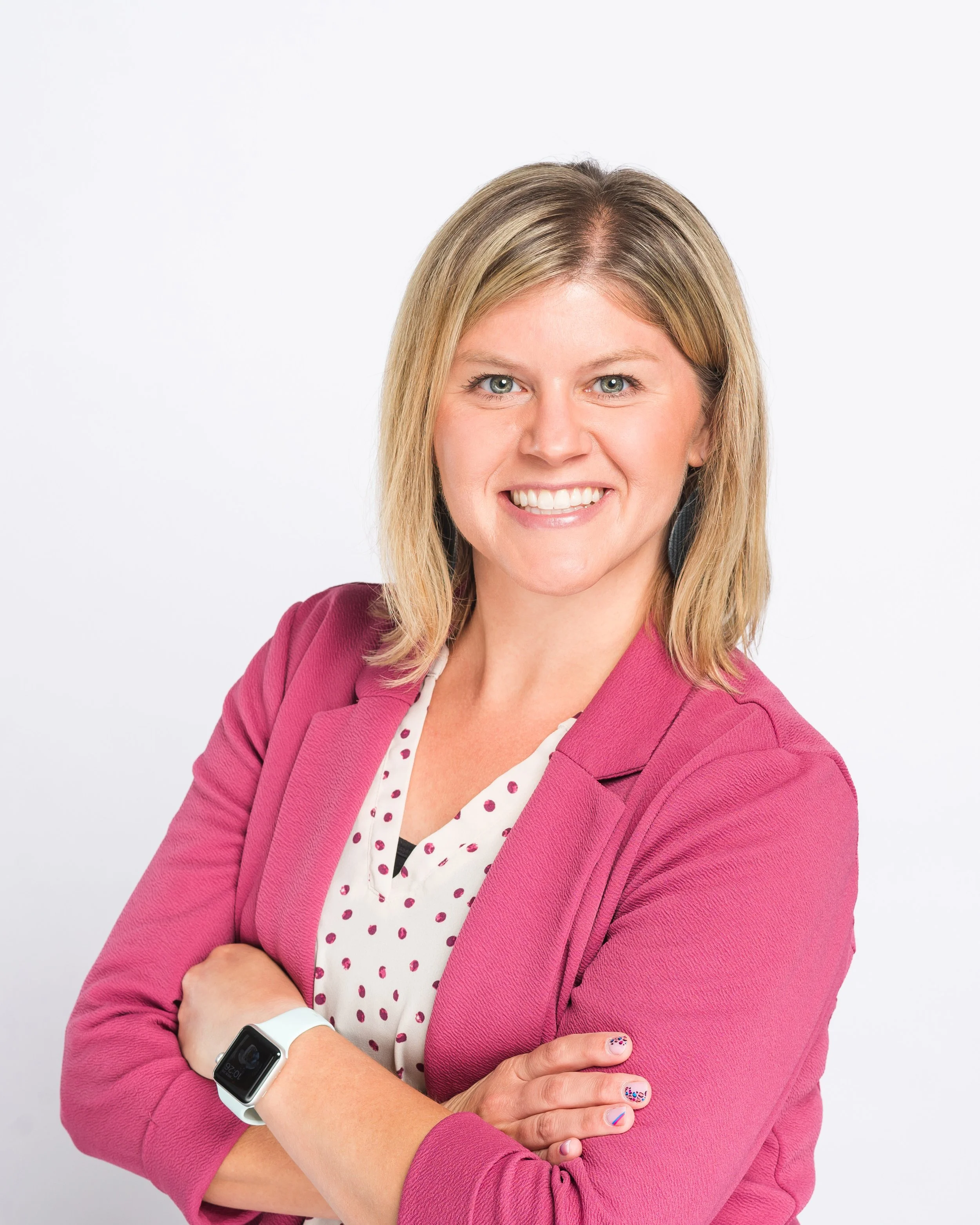 Close-up professional headshot of a woman entrepreneur, natural light, brand photography session in Bloomington Normal Illinois.