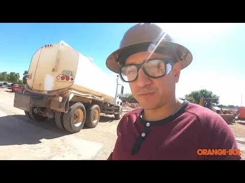 Cleaning a construction water truck with heavy build-up using ORANGE-SOL®