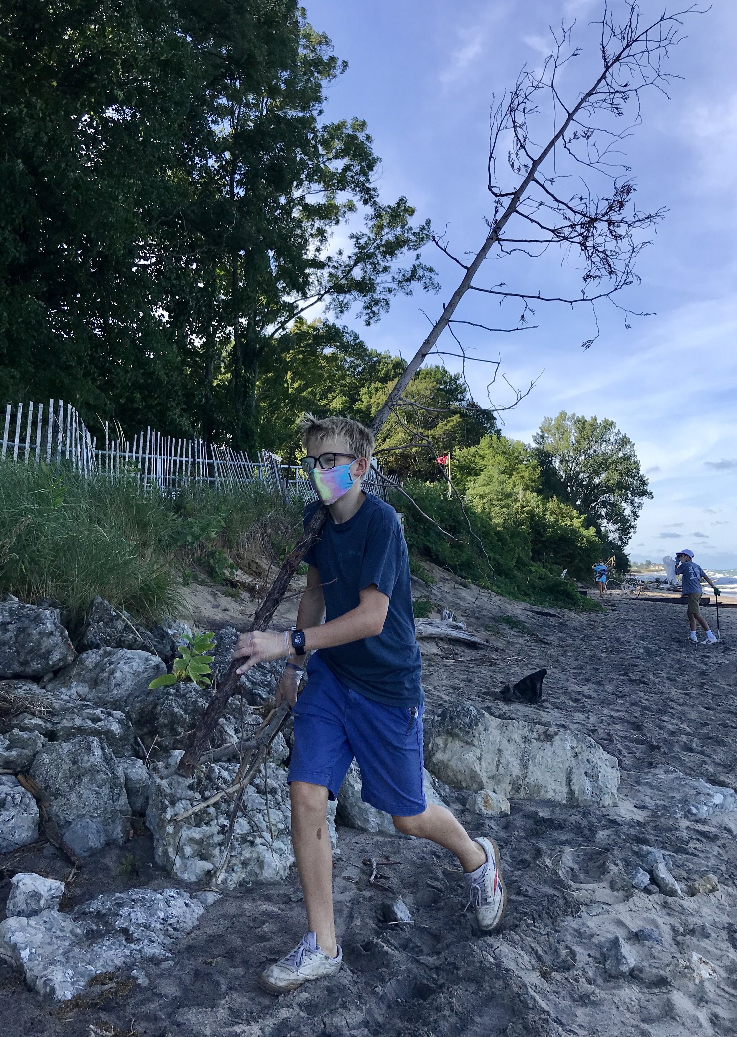 Member Hauling Large Branch.jpg