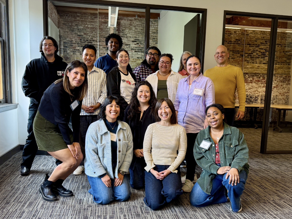 Fourteen individuals who participated in the NWHF Compliance Cohort gather for a group photo