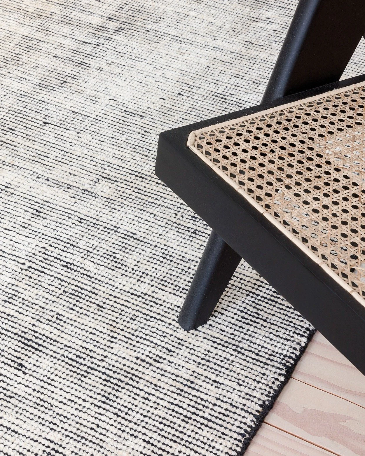 Detail of the Oat rug - a balance of texture and contrast.⁠
⁠
Handwoven with natural wool, designed to bring warmth and depth to any space. ⁠

The organic irregularities and subtle black-and-white tones create a timeless, effortless elegance.⁠

Rug @