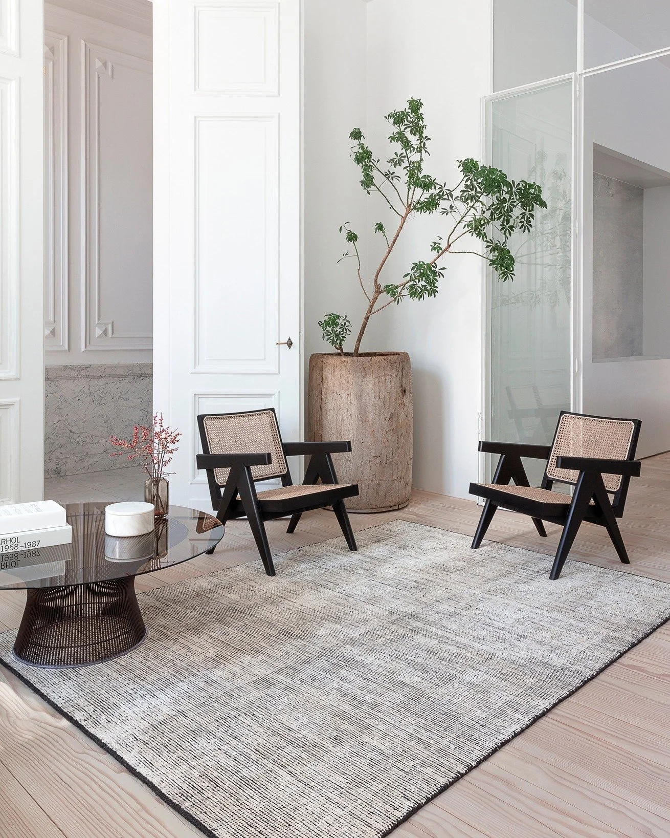 The Oat rug seamlessly anchors the setting, balancing light and shadow, softness and structure. ⁠
⁠
A dialogue between design and atmosphere.
⁠
Rug design and styling, creatively directed by @maghaliedooms  for @lignepure 

Photograph by @bruno_egger