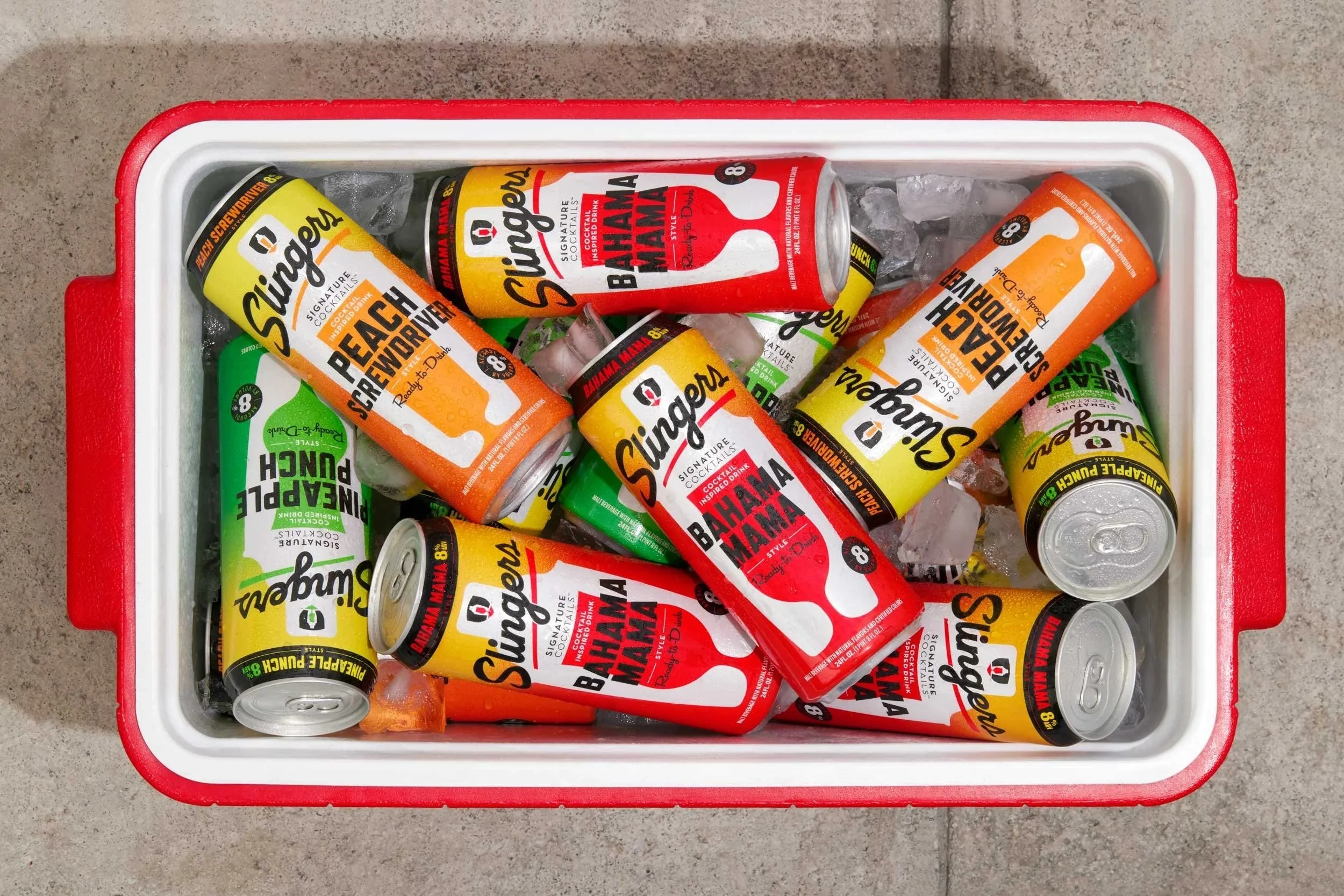 Slingers malt beverage cans in cooler filled with ice photographed for product launch campaign.